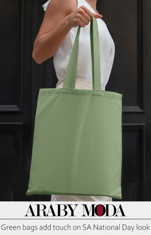 Green bags adding touch on Saudi National Day look