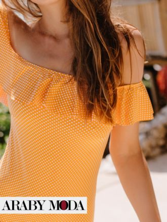 A bright yellow polka-dot swimsuit