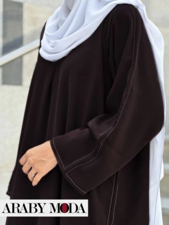 The warmth of the autumn abaya will be brown for October