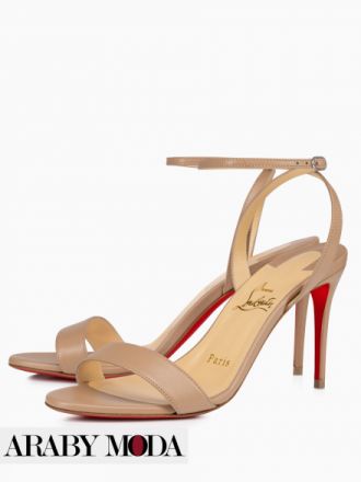 Christian Louboutin sandals with a red sole that emphasizes luxury