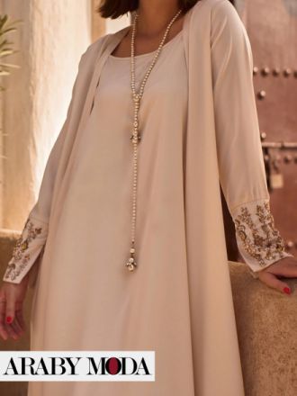 Silk abaya for fall with gold embroidery on the sleeves to emphasize luxury