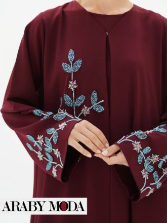 تطريزات الخرز على العباية العنابية لشهر رمضان تطريزات الخرز على العباية العنابية لشهر رمضان