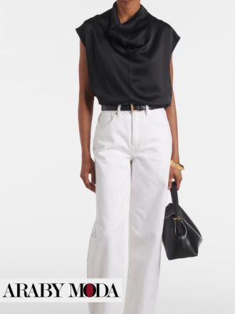 Simple elegant outfit with white jeans and a black satin blouse