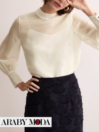 White blouse will accompany you in fall & winter looks with a black skirt