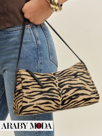 جانبك المفترس يظهر للجميع مع شنطة بطبعات جلد النمر