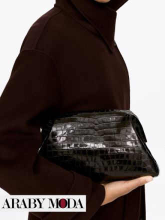 شنطة سوداء بتأثيرات جلد التمساح هي الاكثر فخامة وجذبا للانظار شنطة سوداء بتأثيرات جلد التمساح هي الاكثر فخامة وجذبا للانظار