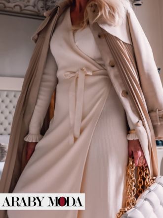 اعتمد على سحر الفساتين الملفوفة في اطلالات الشتاء لاخفاء البطن اعتمد على سحر الفساتين الملفوفة في اطلالات الشتاء لاخفاء البطن