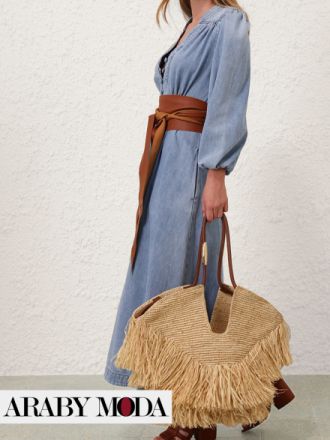 Summertime companion with the Zimmermann Goldentime Raffia Tassel Bag