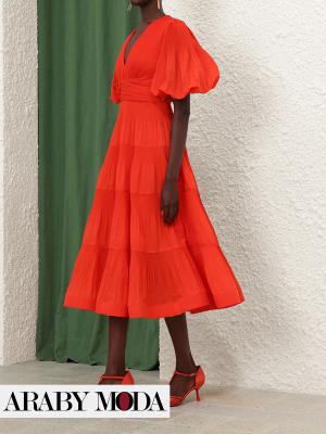 Zimmermann red dress with layers for a luxurious, youthful look