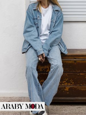 Youthful winter look consisting of jeans and a denim jacket