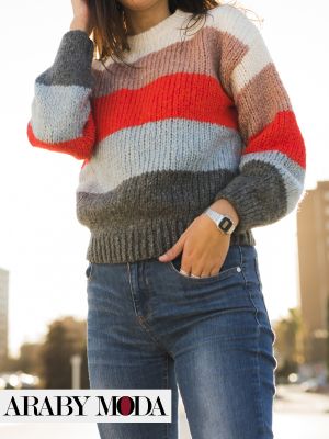 Classic jeans with a colorful sweater indicate your experience in styling clothes Winter