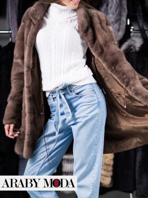 Long fur jacket with jeans for a great look