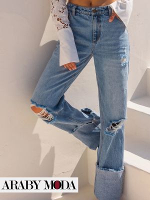 جينز المطوي يعود للواجهة بصورة اكثر عصرية ضمن موسم الشتاء