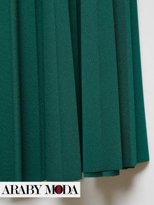 Close-up view of Mango skirt fabric