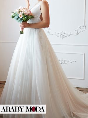 Classic white, puffy wedding dress with a long train