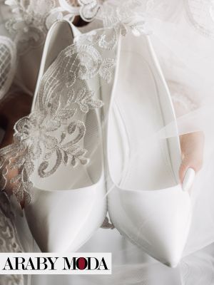Classic white wedding heels that coordinate with any wedding dress