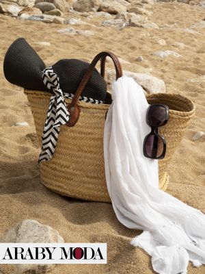 Straw beach bag to carry your belongings while you stroll along the beach on your honeymoon