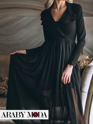 A stunning long, black evening dress for honeymoon celebrations