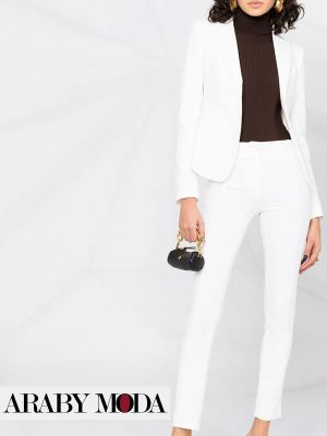 White blazer and pants with a brown sweater will make your formal look more beautiful and soft