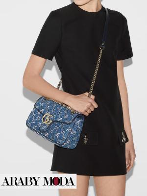 Gucci Jeans Marmont bag coordinated with a dress