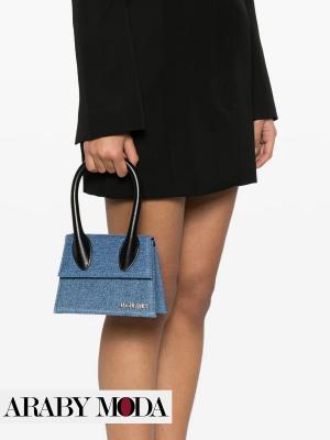 Jacquemus Le Chiquito jeans bag with a black dress