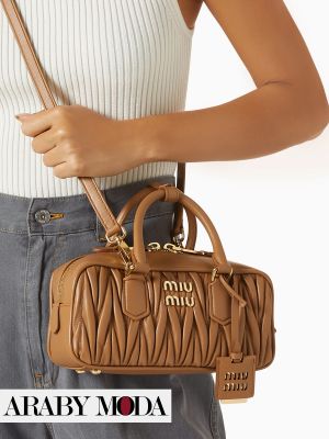 Miu Miu Arcadie bag accompanies the Ramadan and March outfit