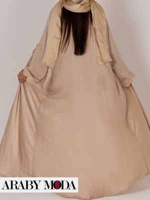 Golden beige abaya that reflects luxurious images from the Ramadan and March outfit