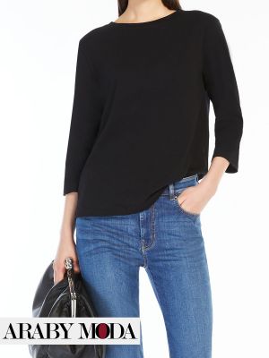 Max Mara T-shirt matched with black pants to be the March Ramadan outfit