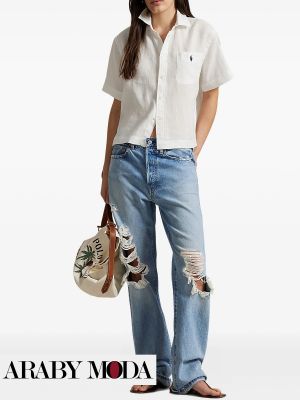 Ripped blue jeans for millennial women to awaken their youthful spirit