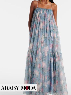 Chloe summer dress with floral prints on blue background reflects the femininity & softness of millennial women
