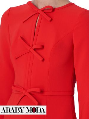 Closing up on Carolina Herrera red dress