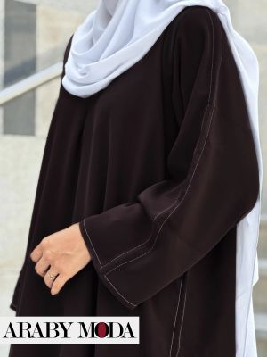 The warmth of the autumn abaya will be brown for October