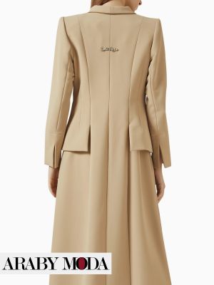 Blazer-designed abaya with the Apple Wang logo on the back