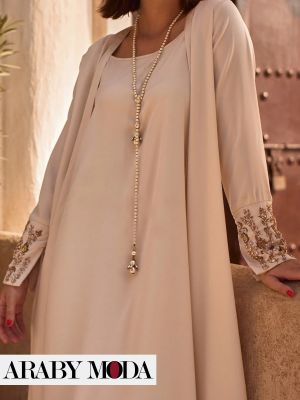 Silk abaya for fall with gold embroidery on the sleeves to emphasize luxury