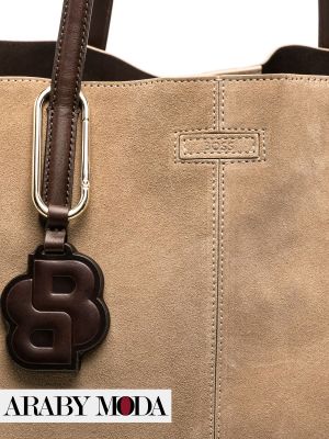 Close-up image of Boss Suede Bag Showing the Brand's Engraved and Leather Logo