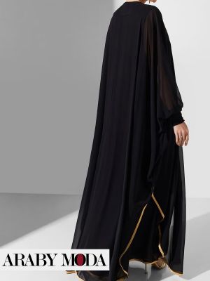 Threads Gold adorns the classic Ramadan caftan