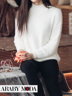 The contrast of white with black creates a unique winter look