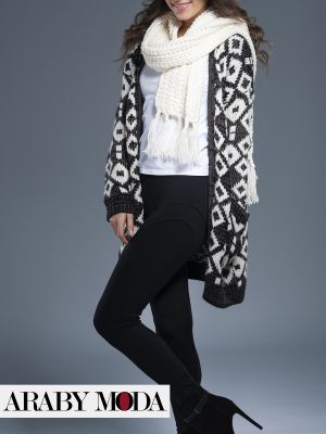 Elegance combines black with white in winter looks