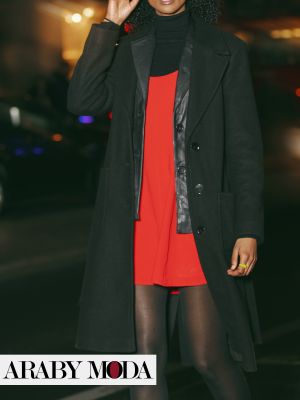 Black coat adds splendor to the red dress in fall and winter looks