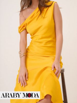 اظهري حنينك للصيف المشرق مع فستان لون اصفر ليموني